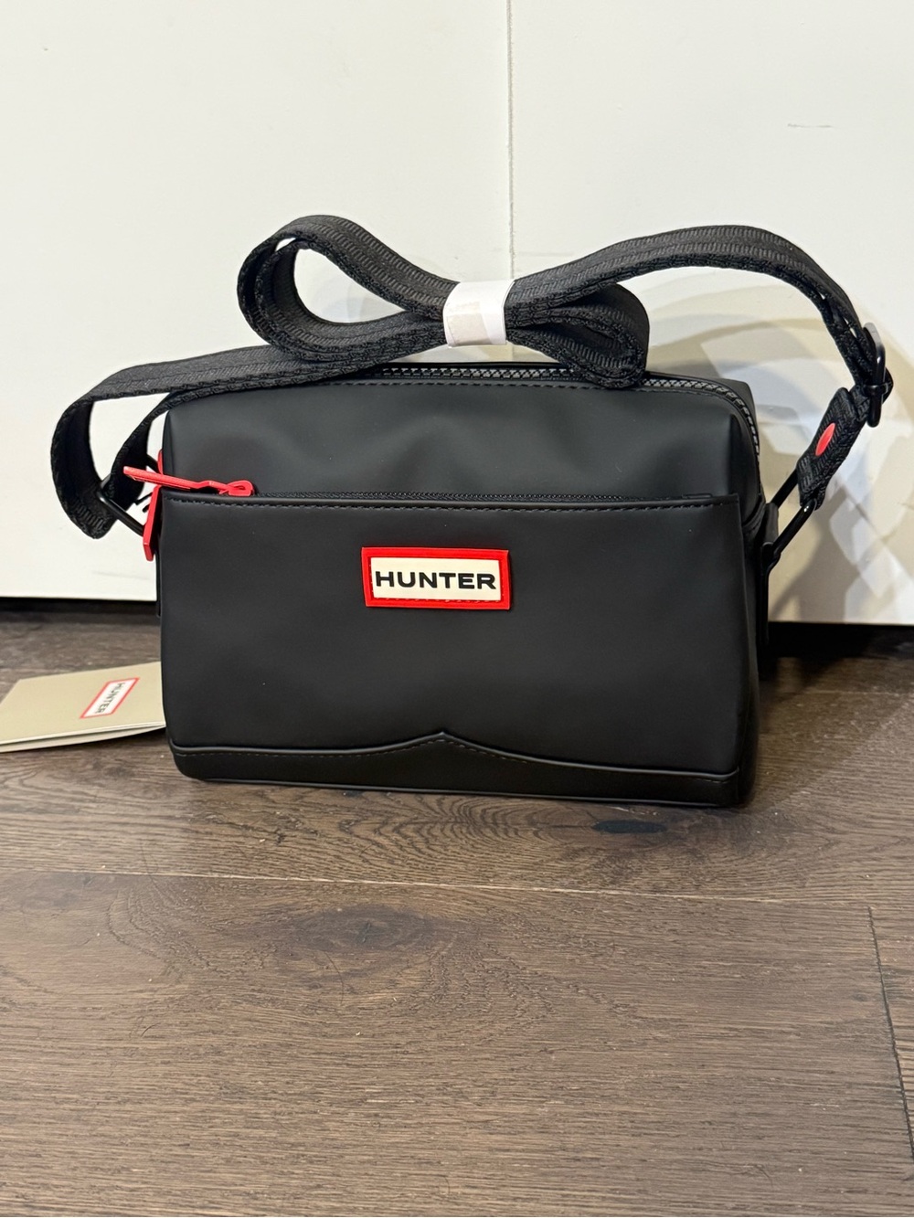 Hunter Black Crossbody Camera Bag with Red Accents. NWT